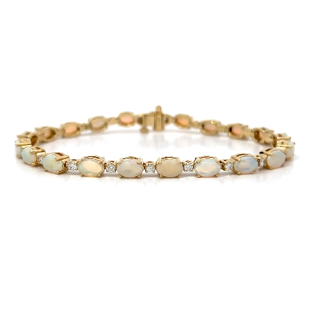 /home/earthtreasures/catalog.shopearthtreasures.com/imagedumplarge/EARTH_E9-00083.jpg 14K Yellow Gold Alternating East to West Oval B...