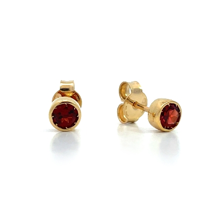 /home/earthtreasures/catalog.shopearthtreasures.com/imagedumplarge/EARTH_O6-00668.jpg 14K Yellow Gold Round Bezel Garnet Stud Earring...