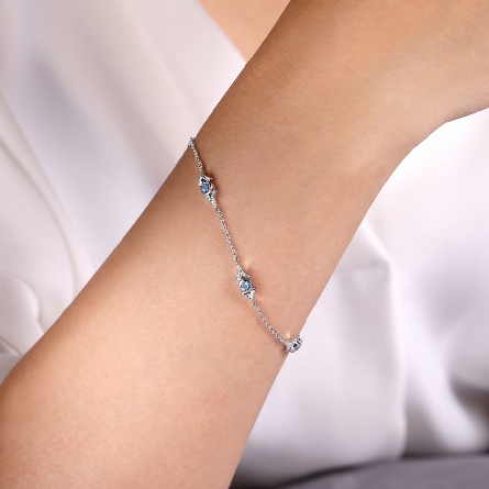 Sterling Silver Gabriel Adjustable 6.5-7inch  Triangle Stations Bracelet w/Swiss Blue Topaz=.61ctw #TB4357SVJBT (S2325726)